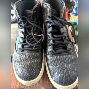 Nike Air Jordan youth 6 black and gold high tops